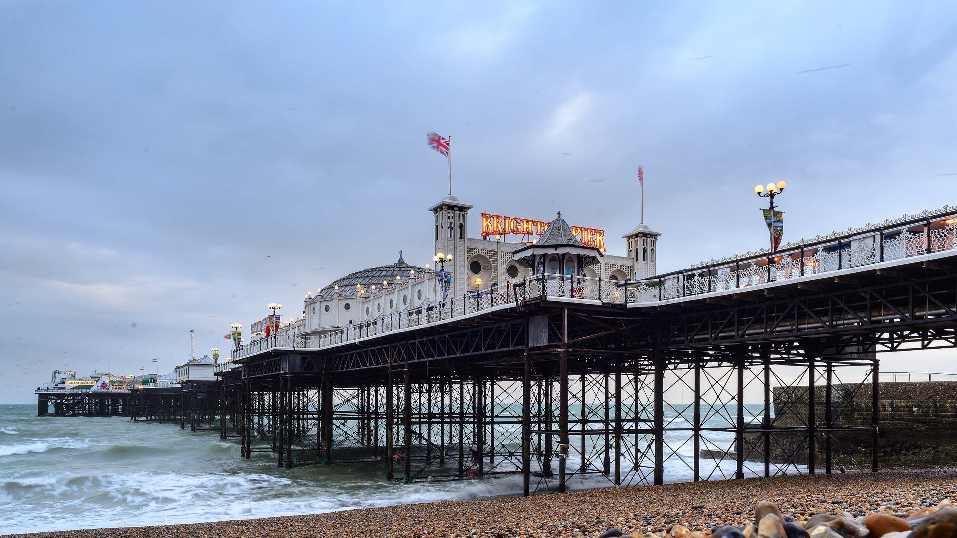 Brighton Palace Pier from the beach under a heavy sky