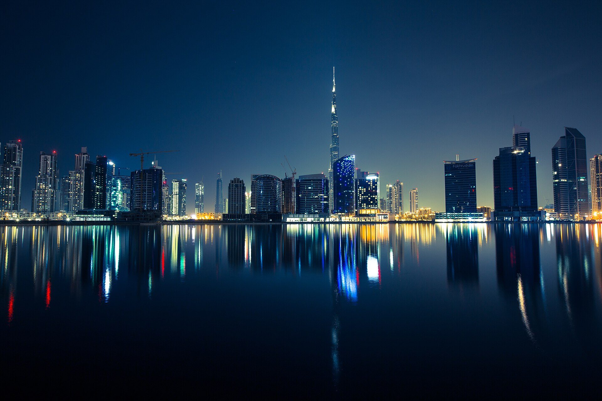 The Dubai skyline across the water at night